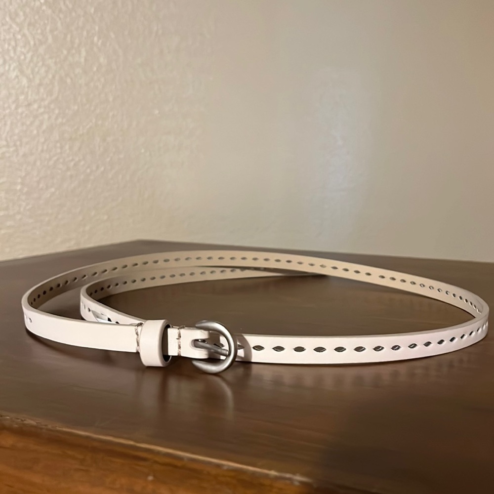 Cream colored thin PU leather belt with silver buckle